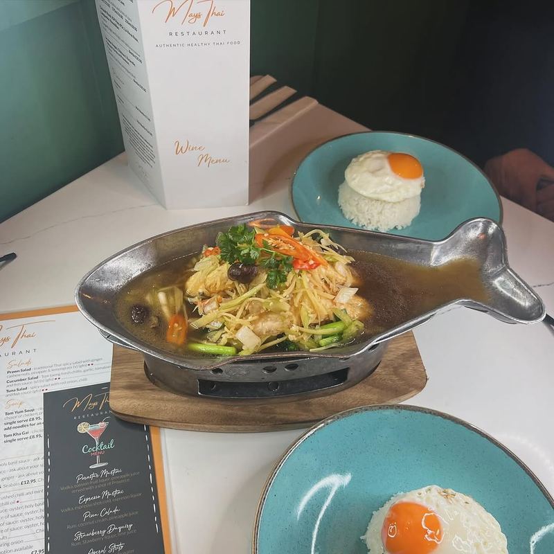 Seabass in plum sauce on a sizzling hotplate